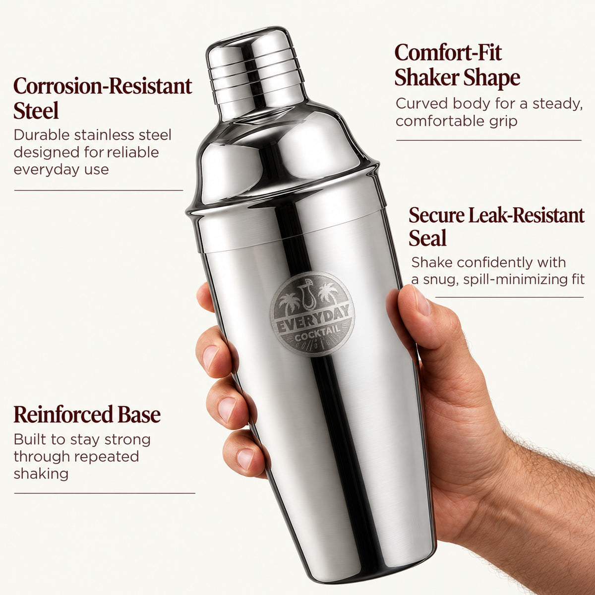 Hand holding the stainless steel cocktail shaker with the Everyday Cocktail logo