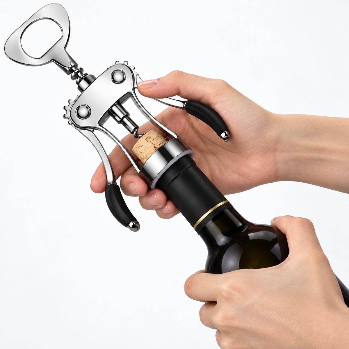 Hands pulling a cork out of a wine bottle with the wing corkscrew