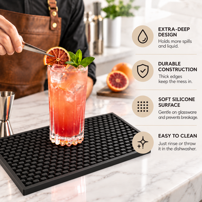 Bar mat in use with a red cocktail, extra deep design, soft silicone surface, easy to clean