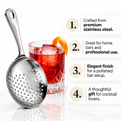 Julep strainer next to a cocktail with an orange peel garnish