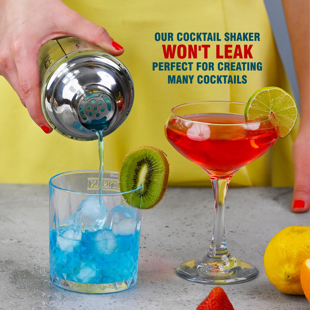The glass cocktail shaker in use, mixing a drink